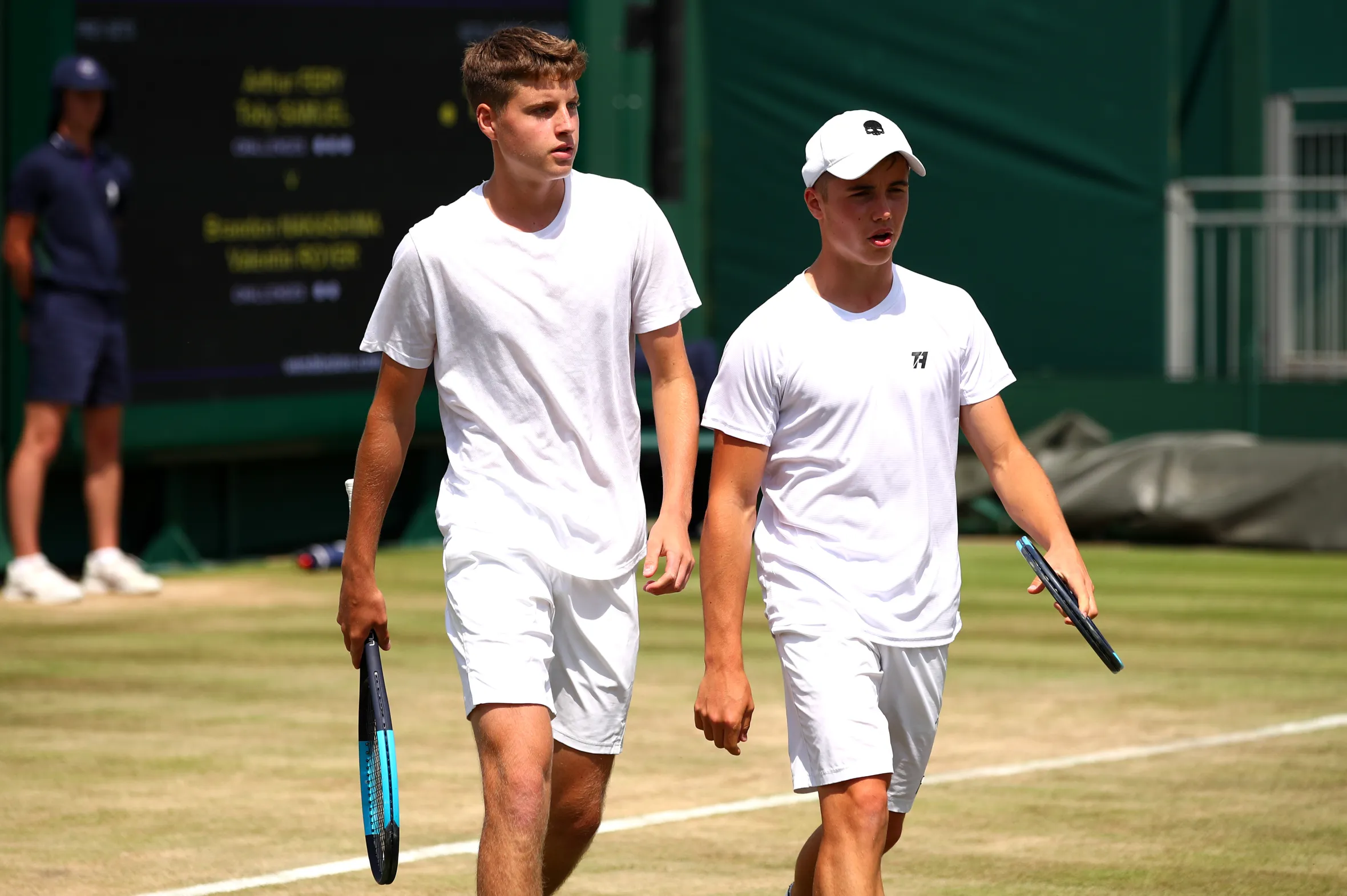 Arthur Fery and Toby Samuel on court during the Wimbledon 2019 match.