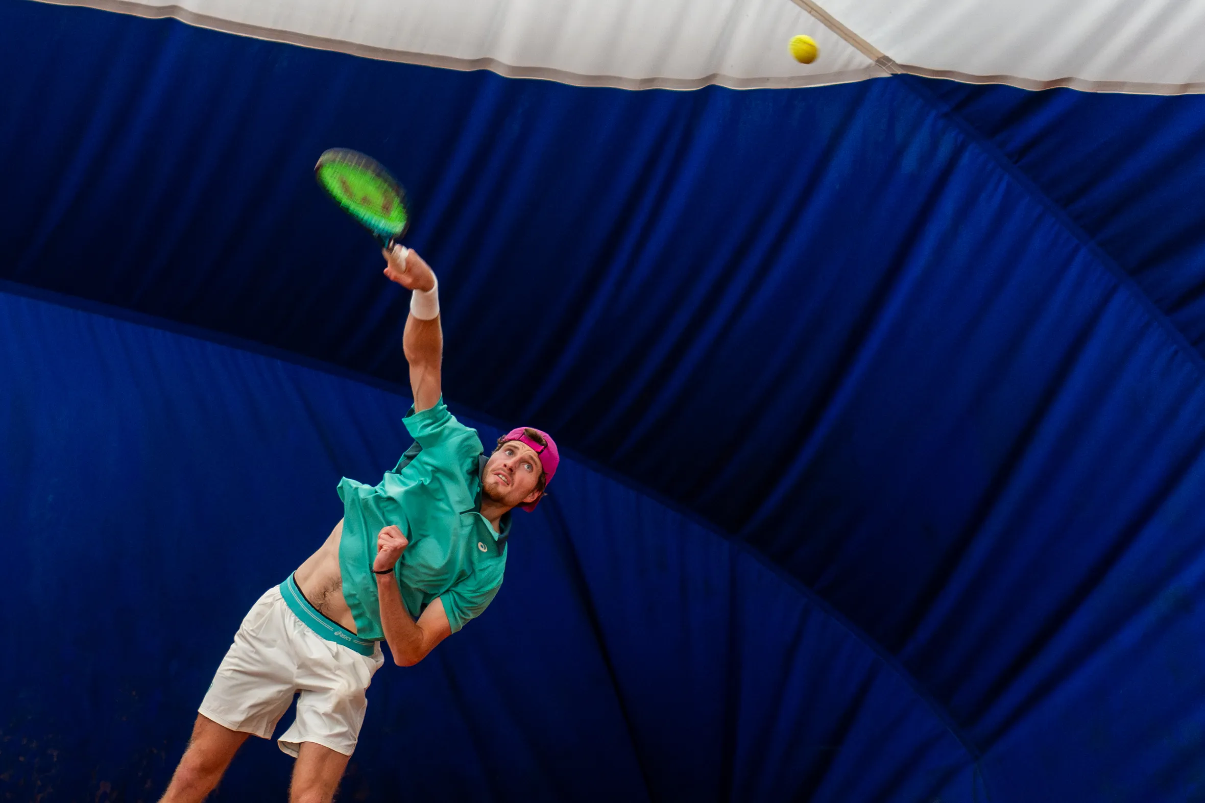 British tennis player Toby Samuel in action.