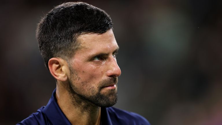 Novak Djokovic of Serbia shows his frustration against Jack Draper of Great Britain in their fourth round match at the BNP Paribas Open in Ind.