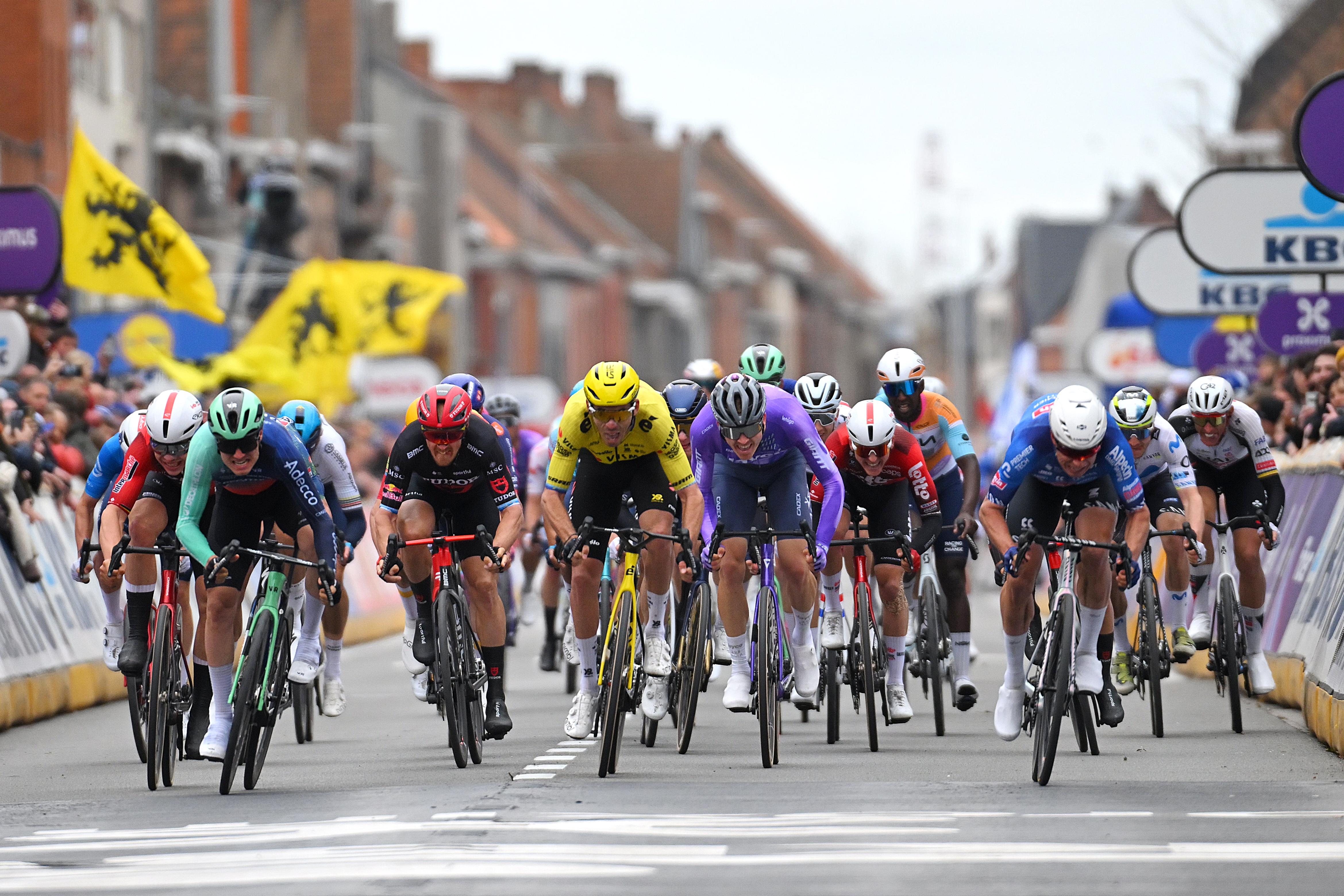 WEVELGEM, BELGIUM - MARCH 29: (LR) Arnaud De Lie of Belgium and Team Lotto Intermarché, Tobias Lund Andresen of Denmark and Team Decathlon CMA CGM, Matteo Trentin of Italy and Team Tudor Pro Cycling, Christophe Laporte of France and Team Visma | Lease a Bike, Robert Donaldson of Great Britain and Team Jayco AlUla and race winner Jasper Philipsen of Belgium and Team Alpecin-Premier Tech sprint finish during the 88th In Flanders Fields - From Middelkerke to Wevelgem 2026 - Men & apos; 29, 2026 Wevelgem, Belgium. (Photo by Tim de Waele/Getty Images)