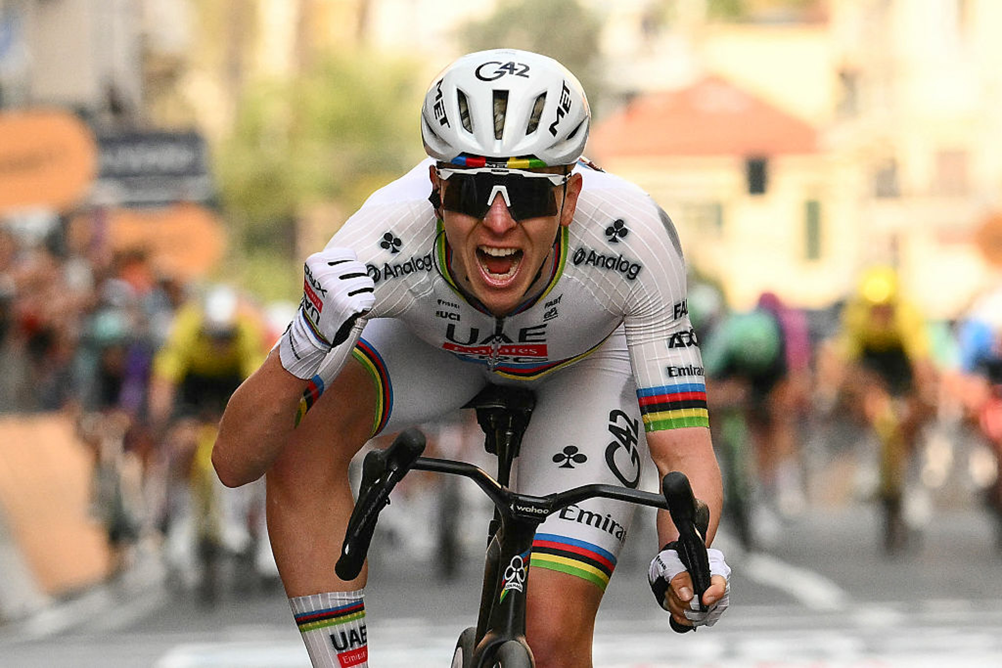 Tadej Pogacar celebrates winning Milan-Sanremo