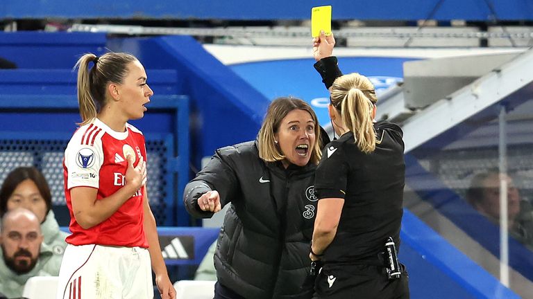 Chelsea manager Sonia Bompastor shouts at referee Frida Mia Klarlund Nielsen, receiving a yellow card, followed by a second.