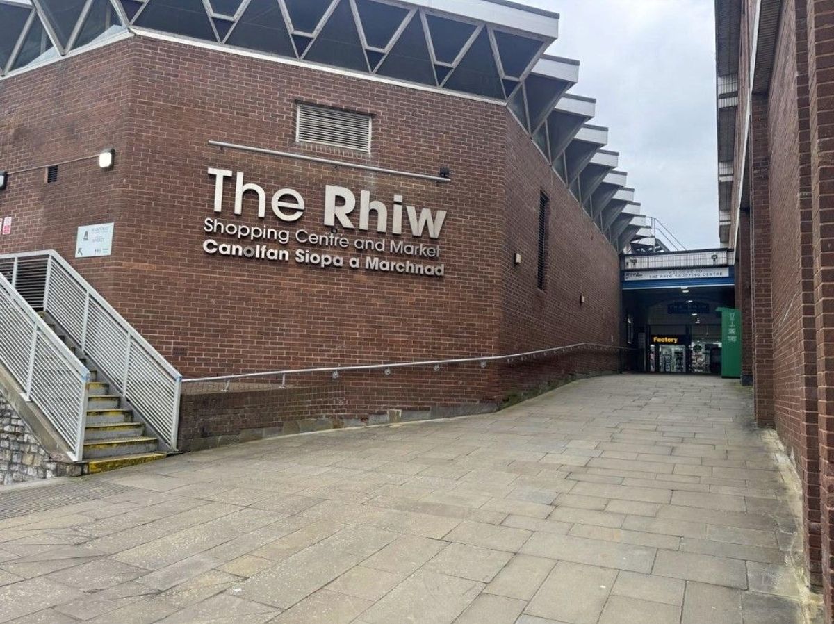 An exterior shot of a tired-looking facility