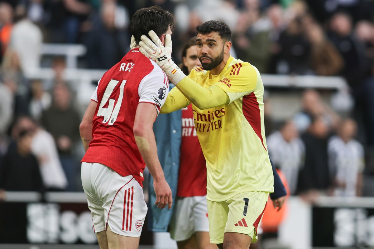 Arsenal's Declan Rice and David Raya celebrate at full-time during the Premier League match between Newcastle United and Arsenal St. James's Park in Newcastle, United Kingdom, on 28 September 2025.