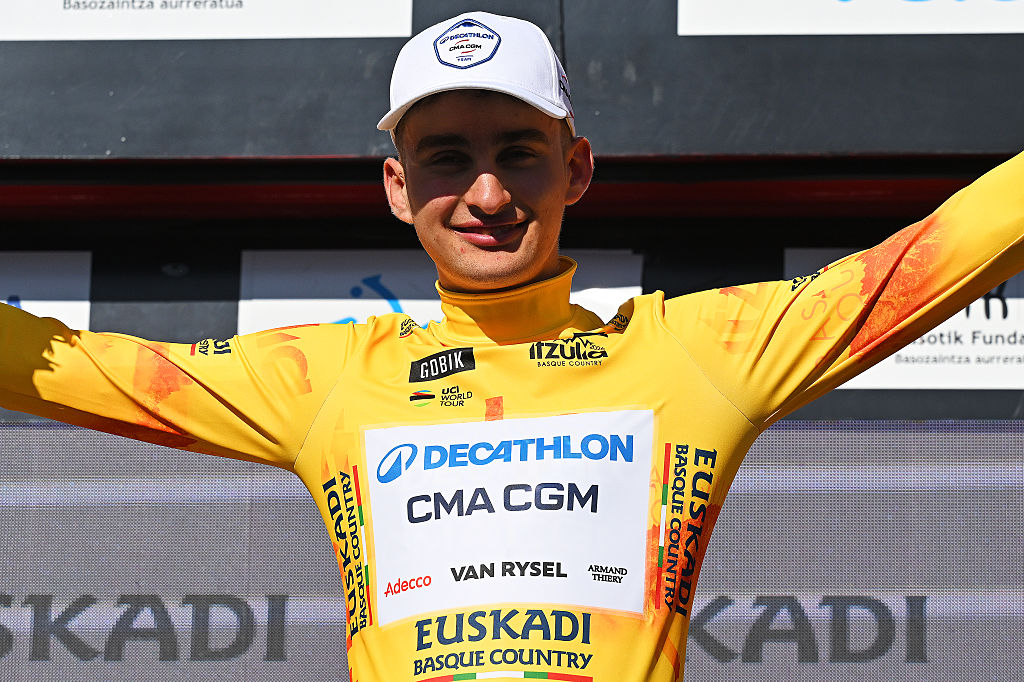 BILBAO, SPAIN - APRIL 06: Paul Seixas of France and Team Decathlon CMA CGM celebrate on the stage as the winner of the Yellow jersey of the leader during the 65th Itzulia Basque Country 2026, Stage 1 to 13.8km individual time trial stage from Bilbao to Bilbao / #UCIWT on April 2, Bilba 2, Spain. (Photo by Tim de Waele/Getty Images)