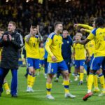 Gabriel Gudmundsson celebrates Sweden's World Cup qualification